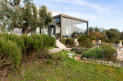 Opera, a sheltered terrace amongst olive groves